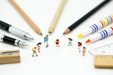 Miniature people : Children and student with School supplies,Education and Back to school concept.の写真素材