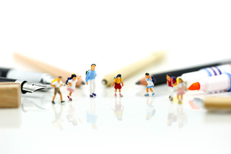 Miniature people : Children and student with School supplies,Education and Back to school concept.