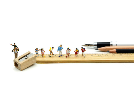 Miniature people : Children and student with School supplies,Education and Back to school concept.