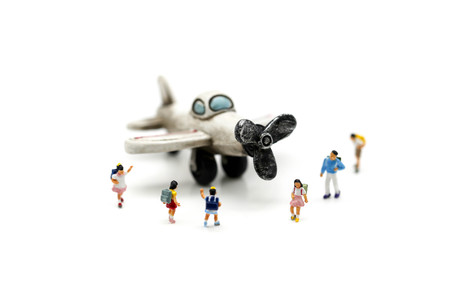 Miniature people : student and children with airplane,education and fun travel concept.の写真素材