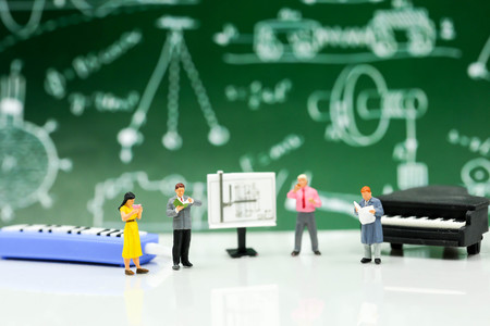 Miniature people : Teacher and student with piano class of music.の写真素材