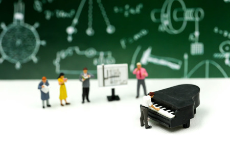 Miniature people : Teacher and student with piano class of music.の写真素材