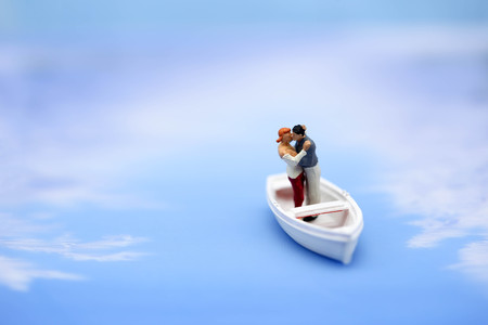 Miniature people  couple of love on Paddle boats,lover concept.の写真素材