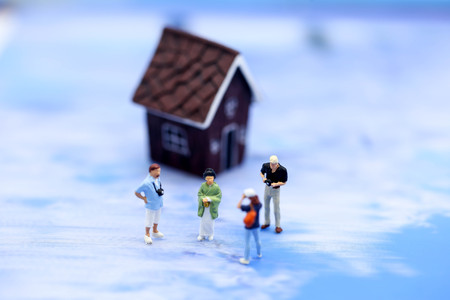 Miniature people : geishas wearing traditional japanese kimono with Traveling  tourist taking photo.の写真素材