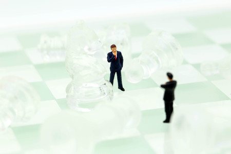 Chess business with miniature people : businessman  idea for competition, success and leadership concept.の写真素材