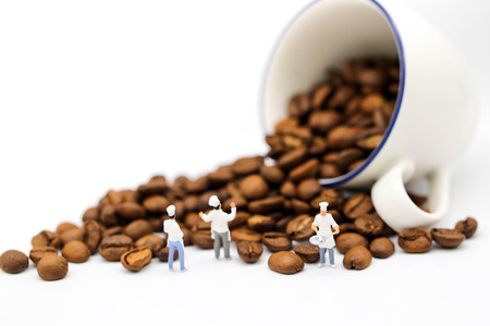 Miniature people : chef cooking with coffee beans,art, creativity and food concept.の写真素材