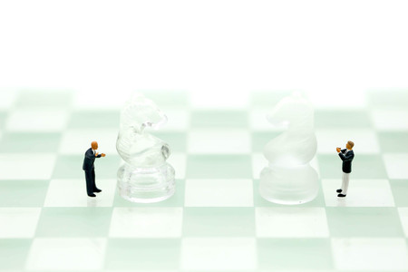 Chess business with miniature people : businessman  idea for competition, success and leadership concept.の写真素材