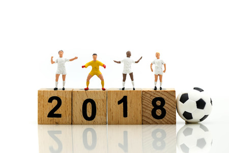Miniature people : Soccer player man,football world championship cup concept.の写真素材