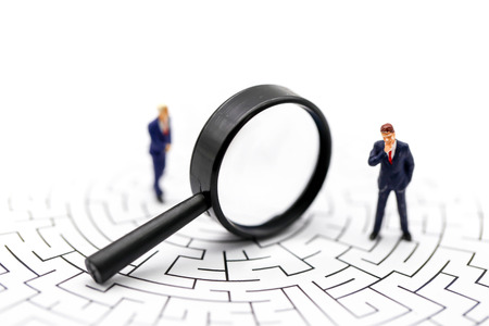 Miniature people : Successful businessman with magnifying glass of young businessman,Business Growth...