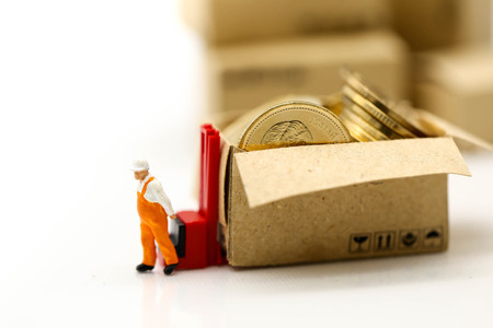 Miniature people: Worker and box with businessman shipping, rent container, business concept.
