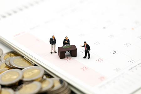 Miniature people : businessman and people for Evaluate using for concept of Evaluate your life Day.