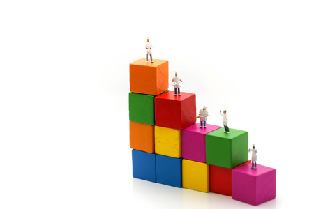 Miniature people : Chef and friend with color toy block,using for concept of International Chef Day.