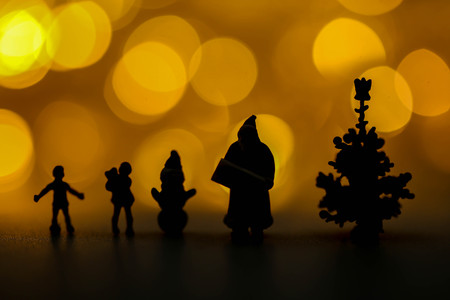 Merry christmas and happy new year Miniature People : Children with Santa Claus doll and his reindeer isolated on white background,in Christmas festival.Silhouette concept.の写真素材