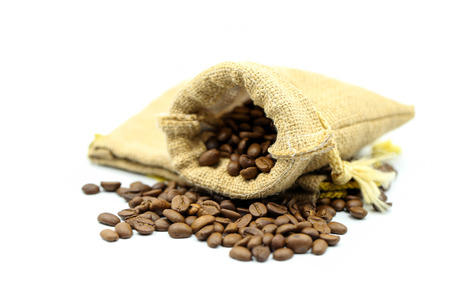 Roasted coffee beans on white background.の写真素材
