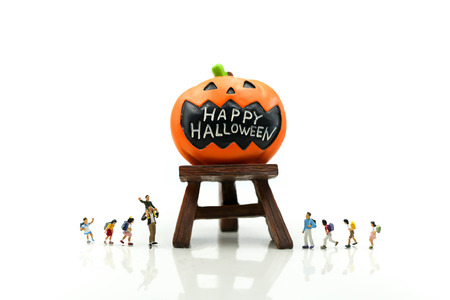 Miniature people : children with Halloween characters decorations using for concept of party halloween holiday concept.の写真素材