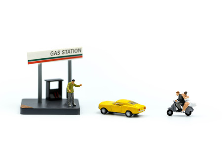 Miniature people : Couple of love Motorcyclists Motorcycle  On Gas Station,honey moon trip.の写真素材