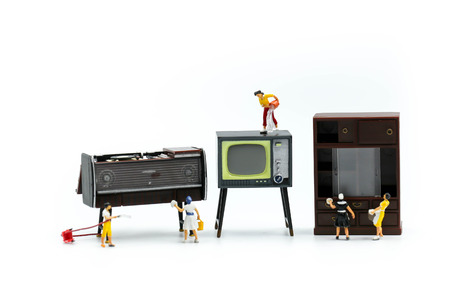 Miniature people : Maid or Housewife cleaning on television.の写真素材