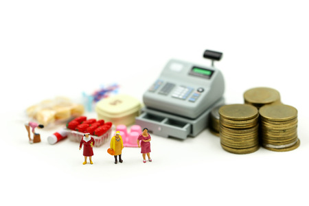 Miniature people : housewife enjoying in shopping at market. Lifestyle, consumerism, shoppingの写真素材