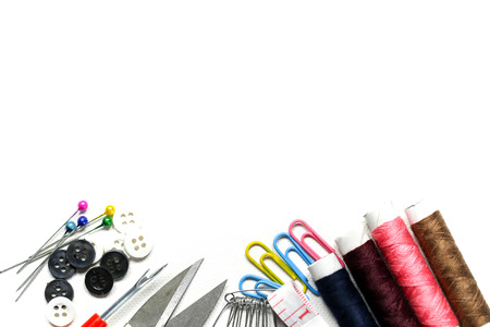 Sewing tools and accesories on white background.の写真素材