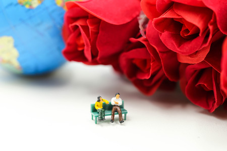 Miniature people : Couple of love with red rose,Lover or valentine's day concept.の写真素材