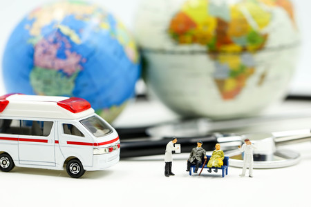 Miniature people : Doctor and patient with ambulance using for concept of Emergencyの写真素材