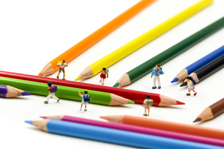 Miniature people : children and student with colorful drawing tools and stationary,education concept.の写真素材