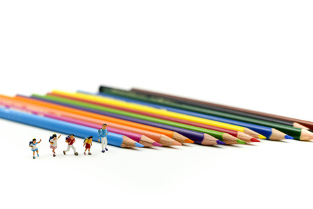 Miniature people : children and student with colorful drawing tools and stationary,education concept.の写真素材
