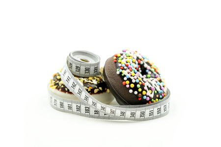 Donut tying by measuring tape,dietary for slim shape concept.の写真素材