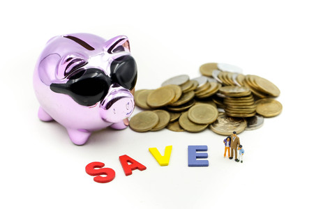 Miniature people : Family  teach children saveing money  coins with piggy bank,Teach your Children to save day.の写真素材