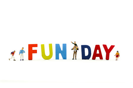 Miniature people : Children and friend funny and enjoy together using for concept of Fun day.の写真素材