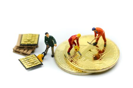 Miniature people : miner Worker Man  digging Bitcoin on white