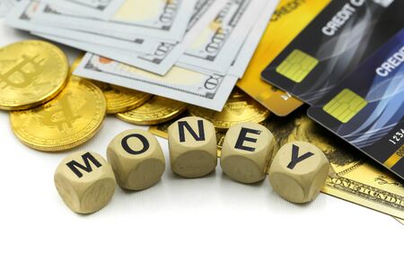 Wooden blocks of money with dollars, bitcoins, credit cardの写真素材