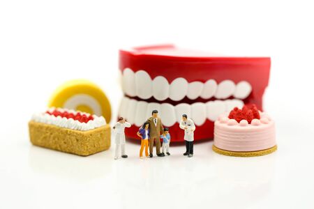 Miniature people : Doctor dentist speaks about student and children with desserts, Fun eating and...
