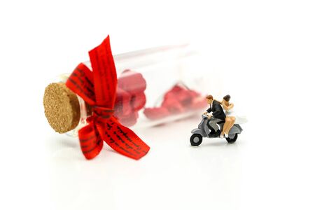 Miniature people : Couple lover with rose and gift box,Lover valentines day concept.の写真素材