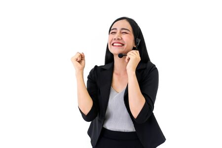 Happy smiling asia woman call center business on whiteの写真素材