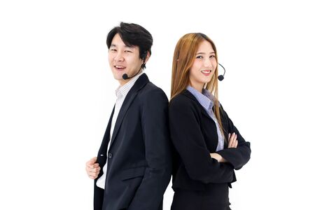 Couple Asia call center workers or Confident business  with headset,Customer support standing on white background.の写真素材