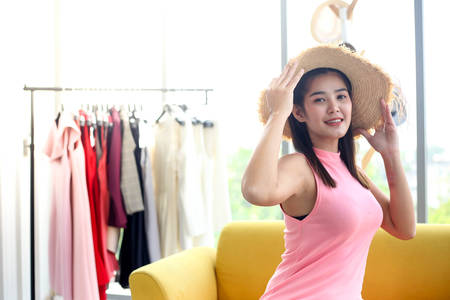 Asian woman beauty blogger or vlogger review ,designer shopping online with hand holding credit card show,Concept Promotion and Sale.の写真素材