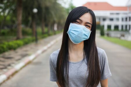 Asian woman  wearing face protectionの写真素材