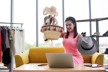 Asian woman beauty blogger review shopping product onlineの写真素材