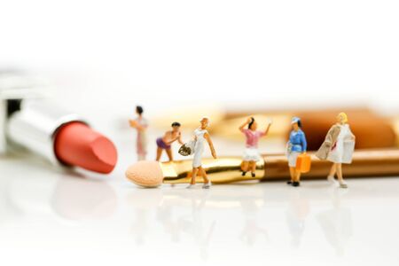 Miniature people : beautiful woman and Makeup products with cosmeticの写真素材