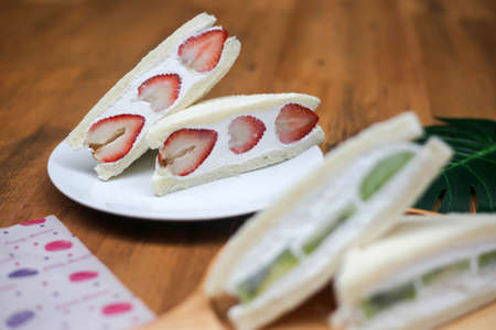 Making sandwich Strawberry fresh cream with fresh whipping cream.の写真素材