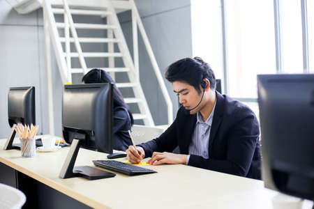 Asia call center workers or Confident business  with headset,Customer supporの写真素材
