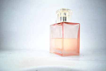 A modern perfume bottle on a white background.の写真素材
