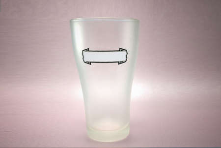 Glass of water on pink backgroundの写真素材