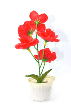 Plastic flowers, red woodの写真素材