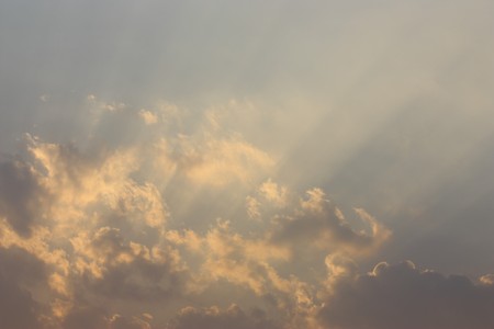 Sun rays cloudy sunset sky