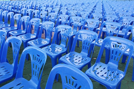 Rows of blue color chairs in an event fieldの写真素材