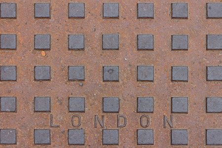 Metal plate background with London textの写真素材