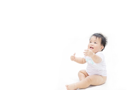 Portrait of cute baby looking for hugの写真素材