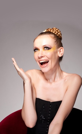 Portrait of a beautiful young woman having a happy thoughtの写真素材